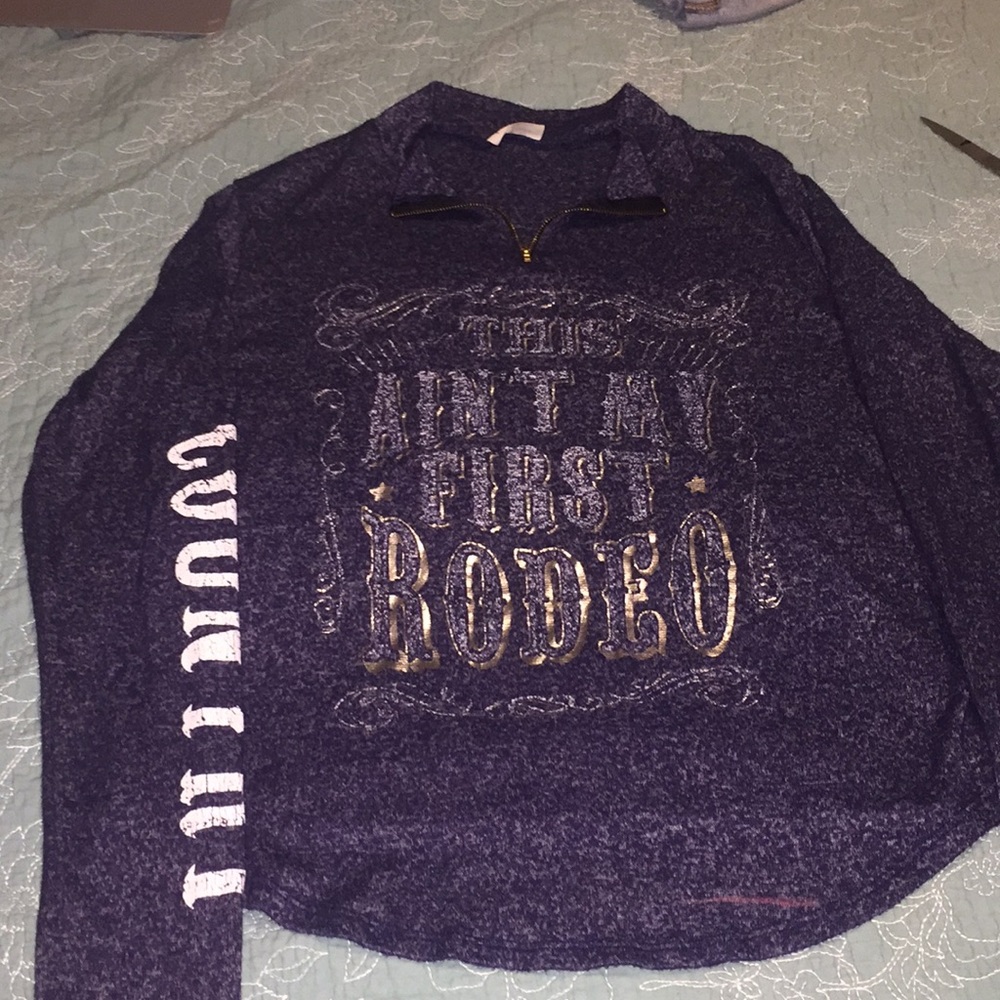 “This ain’t my first rodeo” pullover sweatshirt